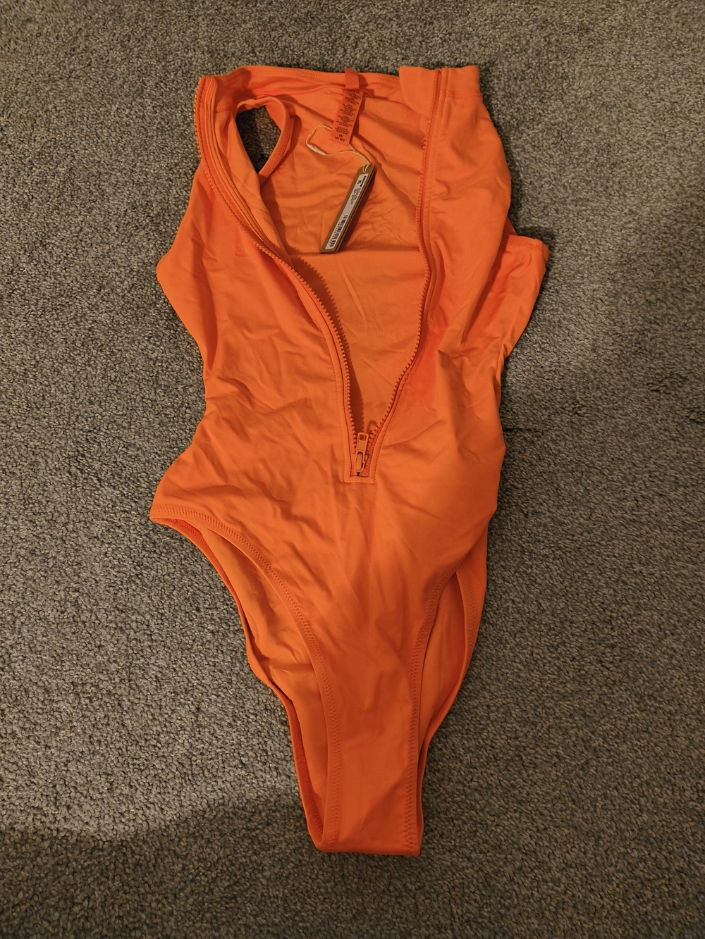 SKIMS Bright Orange One-Piece with Front Zip
